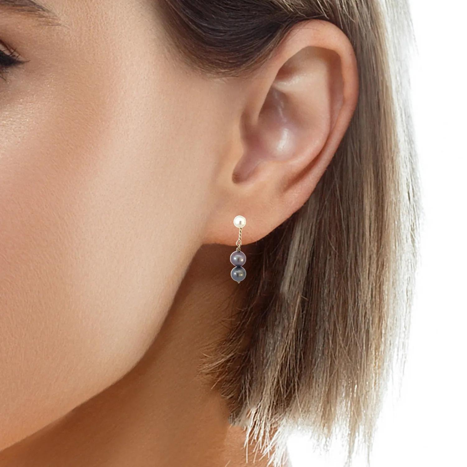 14kt White and Yellow Gold dangling White and Black Pearl earrings