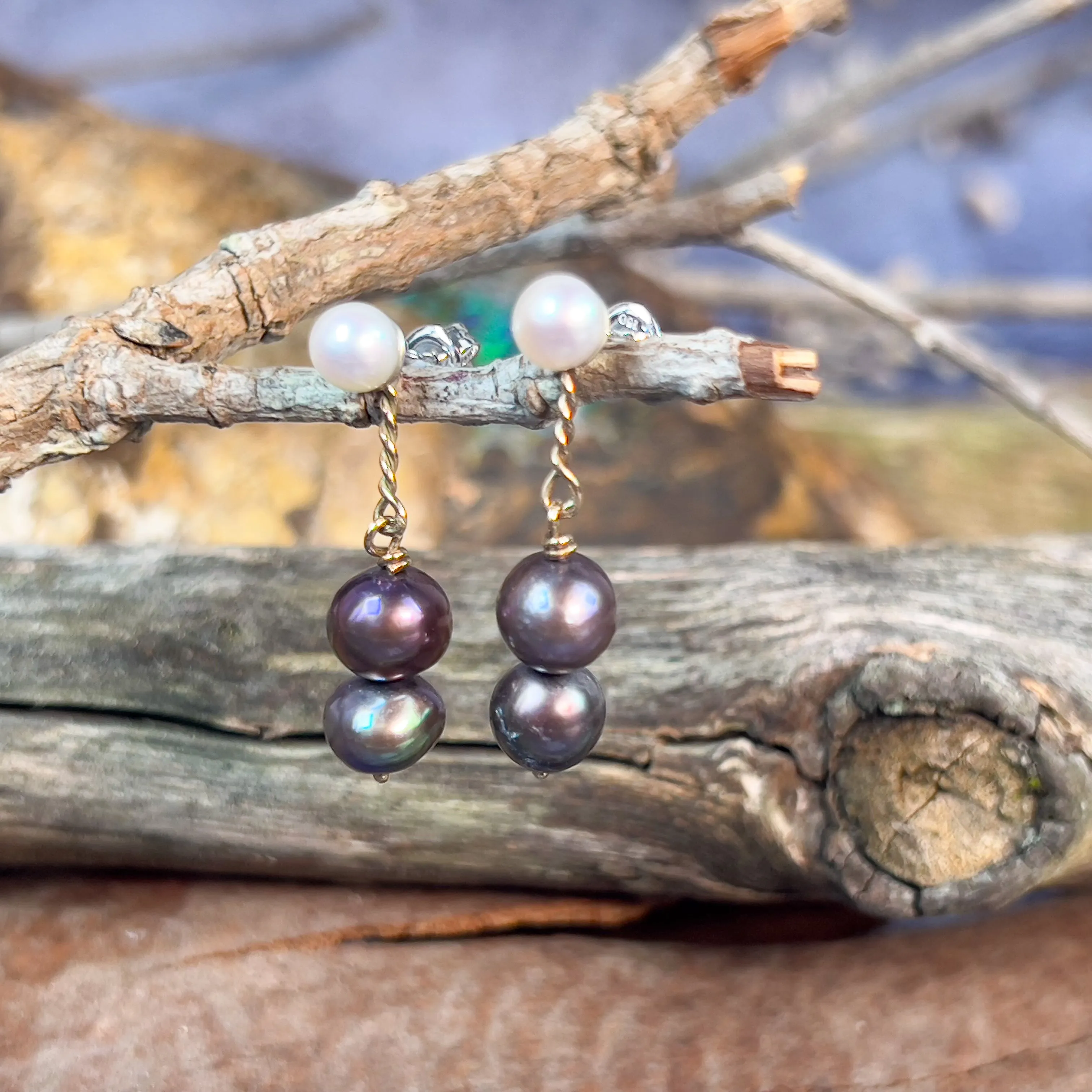 14kt White and Yellow Gold dangling White and Black Pearl earrings