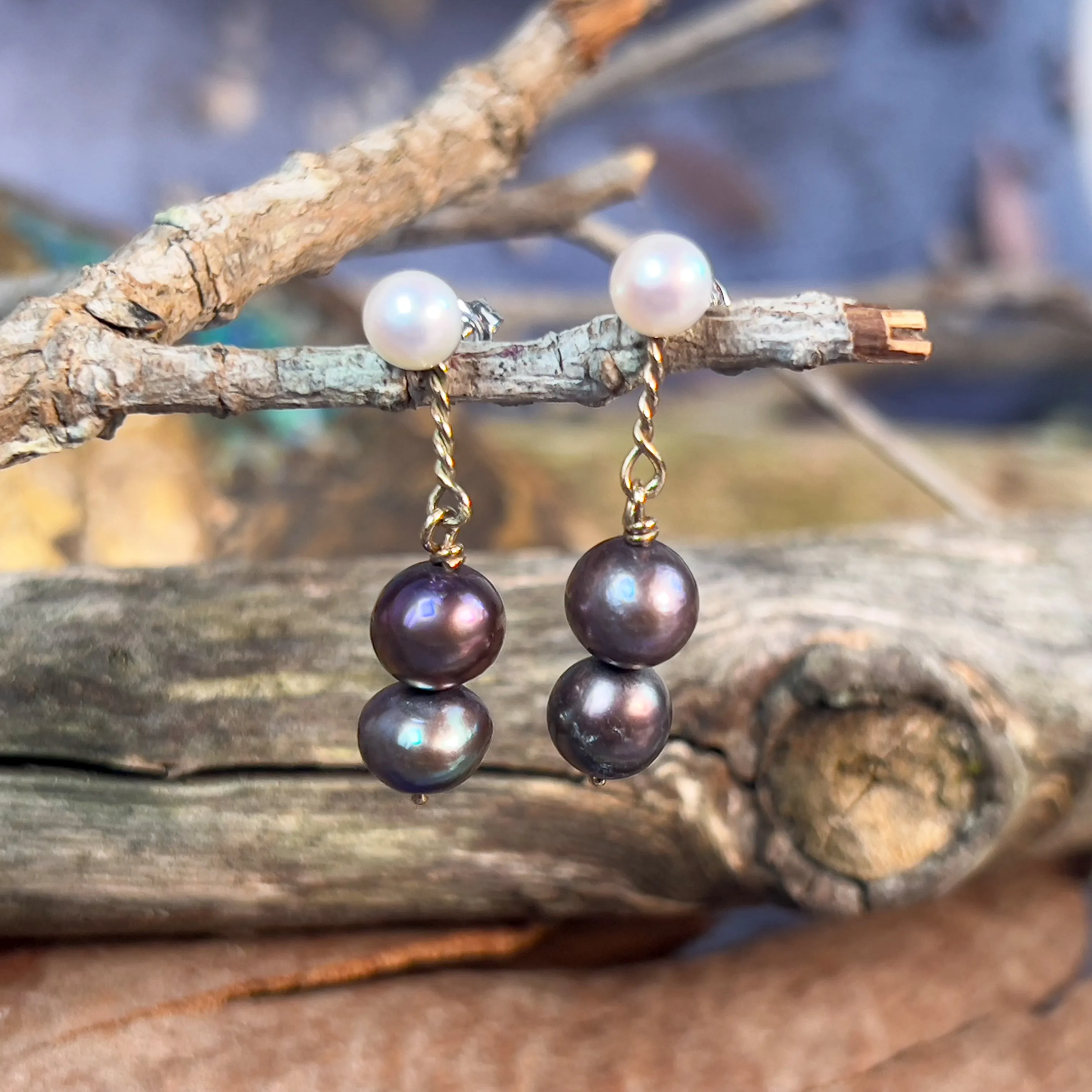 14kt White and Yellow Gold dangling White and Black Pearl earrings